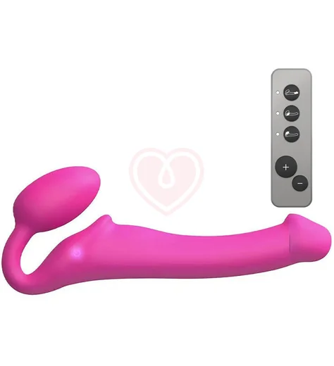 Безремневой страпон с вибрацией и пультом управления Strap-on-me XL розовый фото 1