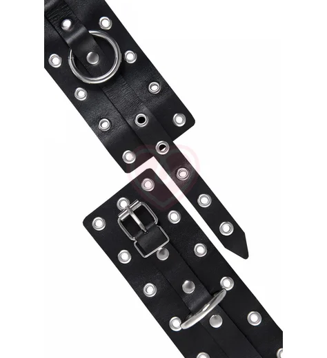 Кожаные наручники с люверсами Pecado BDSM черные фото 6