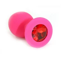 Силиконовая анальная пробка средняя розовая с красным кристаллом