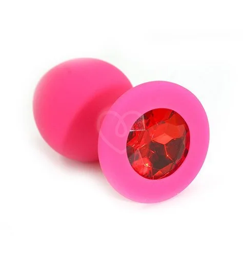 Силиконовая анальная пробка средняя розовая с красным кристаллом фото 1